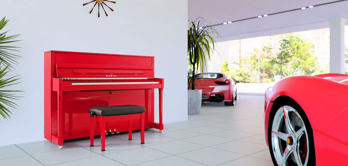 Toàn cảnh đàn piano KAWAI K200 Red Polished tại showroom xe hơi