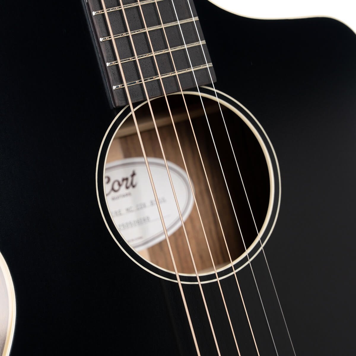 Đàn guitar acoustic điện Cort Core-MC Ovangkol màu Black Top Semi Gloss – cận hoa văn viền lỗ thoát âm (rosette)