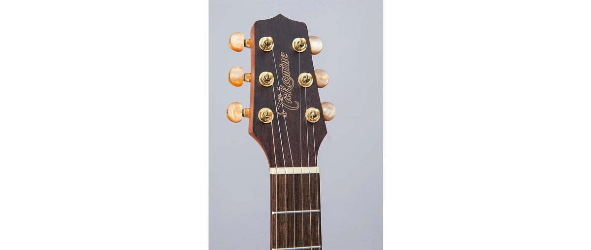 Đàn guitar acoustic điện Takamine GP3HSE màu Natural Satin – cận đầu đàn và logo Takamine