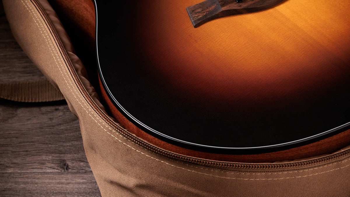 Đàn guitar acoustic điện Taylor 117e Special Edition màu Dark Tobacco Teardrop – bao đàn đi kèm (góc 2)