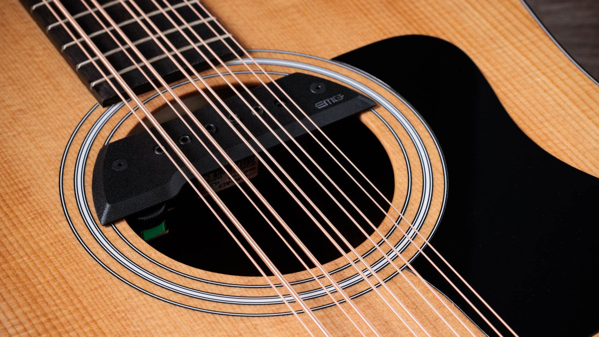 Đàn guitar acoustic điện Taylor 150ce Bajo Quinto màu Natural – cận bộ EQ / pickup