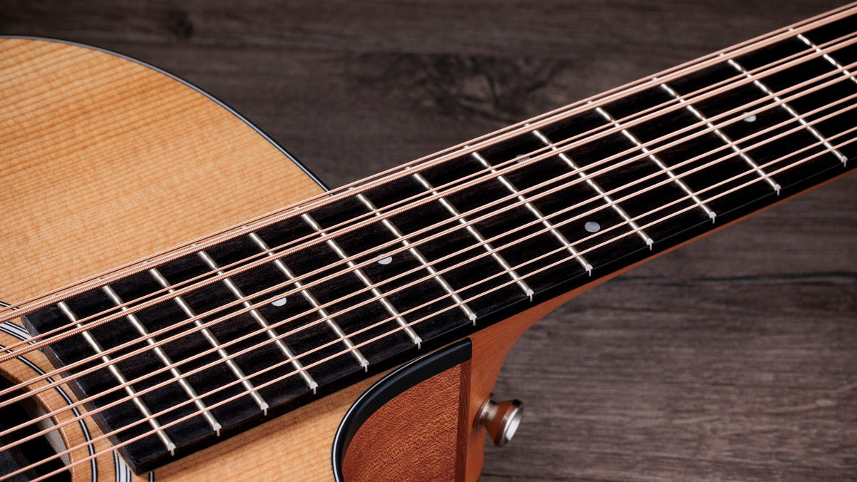 Đàn guitar acoustic điện Taylor 150ce Bajo Quinto màu Natural – cận cần đàn và mặt phím