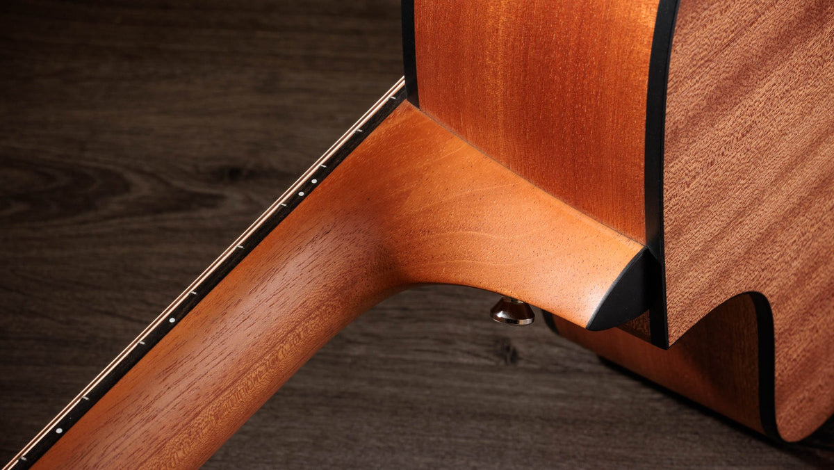 Đàn guitar acoustic điện Taylor 150ce Bajo Quinto màu Natural – cận gót cần nối thân đàn