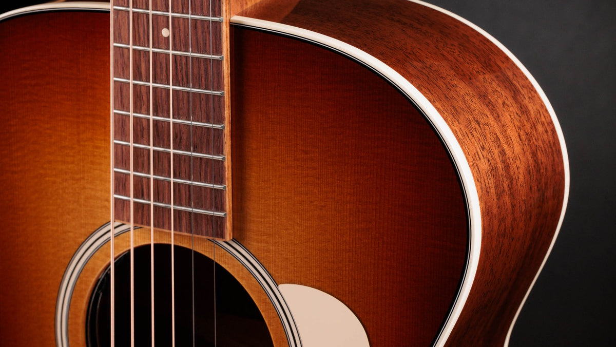 Đàn guitar acoustic điện Taylor Ben Harper Gold Label 512e màu Golden Brown Edgeburst – cận lỗ thoát âm và ngựa đàn