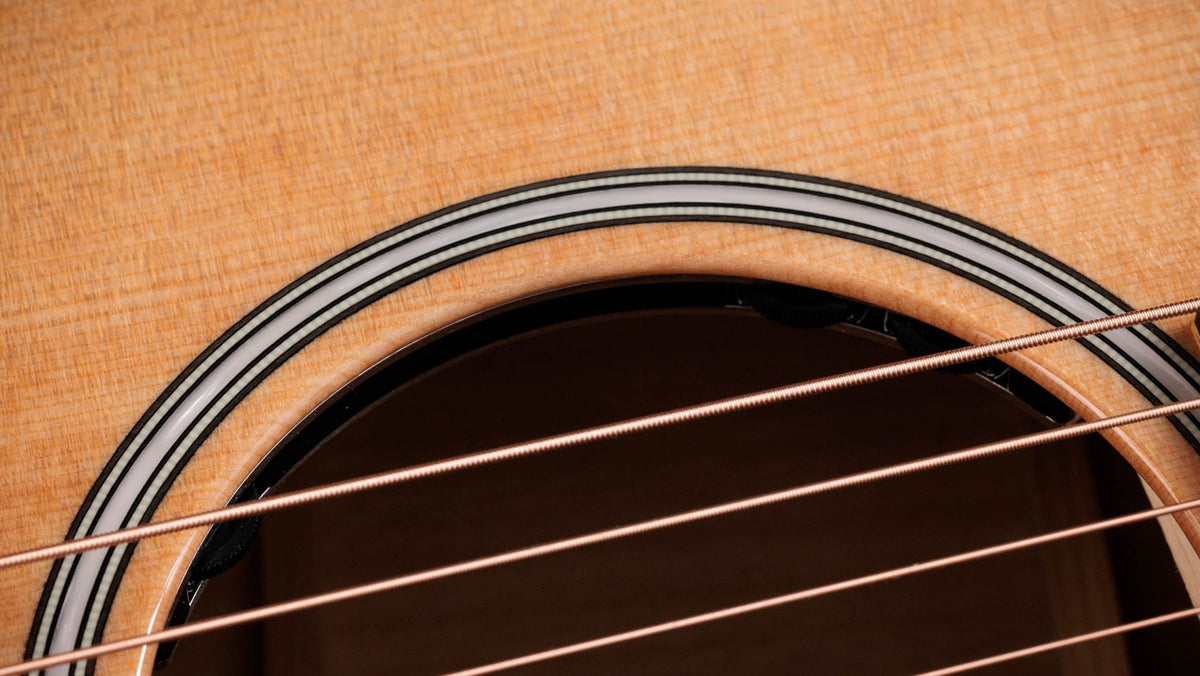 Đàn guitar acoustic điện Taylor Builder's Edition 514ce mặt Natural, lưng hông Kona Burst – cận hoa văn viền lỗ thoát âm (rosette)