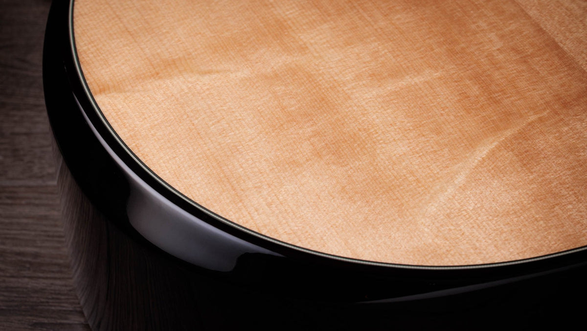 Đàn guitar acoustic điện Taylor Builder's Edition 514ce mặt Natural, lưng hông Kona Burst – cận thùng đàn mặt trước