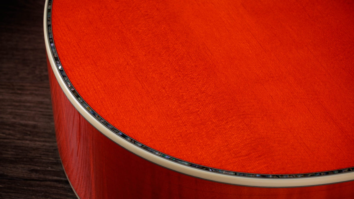 Đàn guitar acoustic điện Taylor Doyle Dykes Signature Model màu Translucent Orange – cận chi tiết hoàn thiện