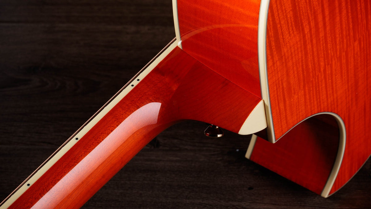 Đàn guitar acoustic điện Taylor Doyle Dykes Signature Model màu Translucent Orange – cận gót cần nối thân đàn