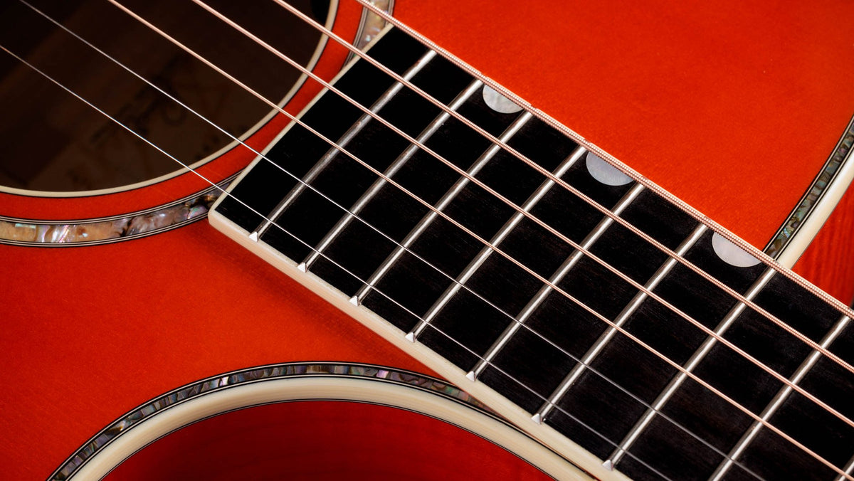 Đàn guitar acoustic điện Taylor Doyle Dykes Signature Model màu Translucent Orange – cận inlay trên mặt phím