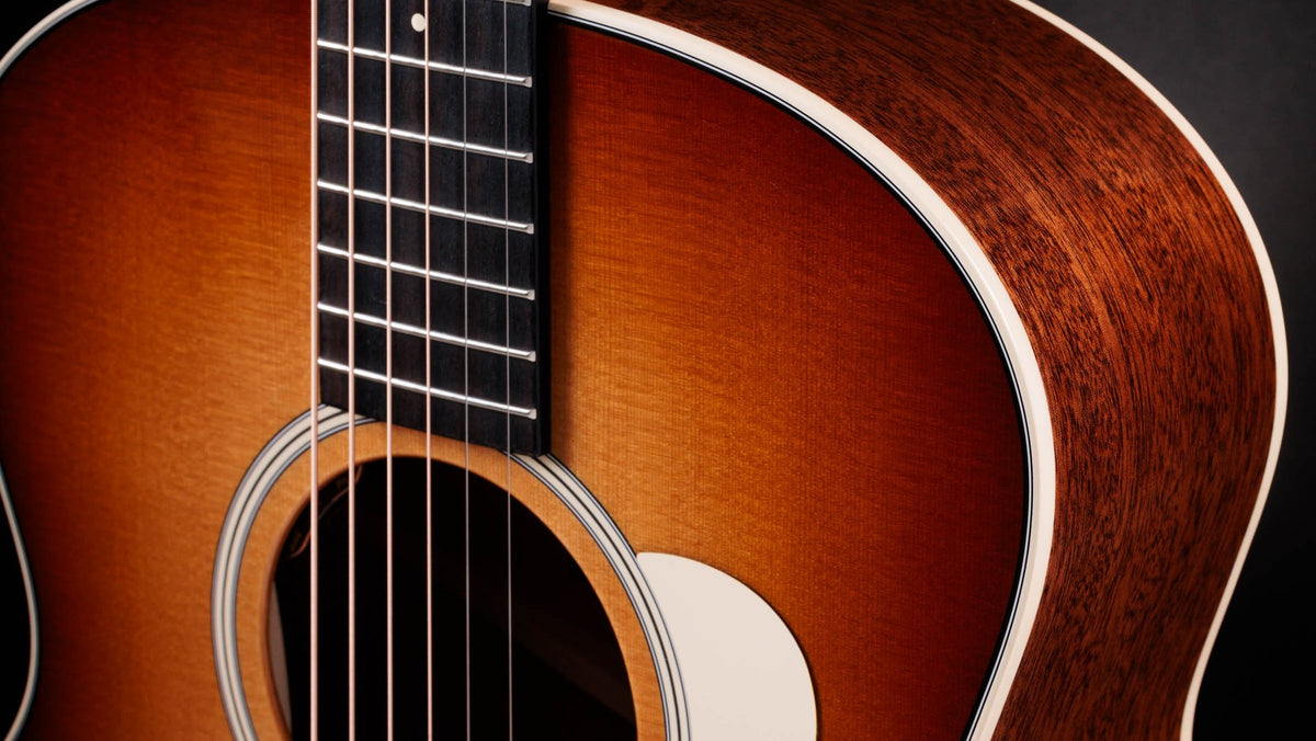 Đàn guitar acoustic điện Taylor Gold Label 514e mặt sunburst, pickguard kem – cận lỗ thoát âm và ngựa đàn
