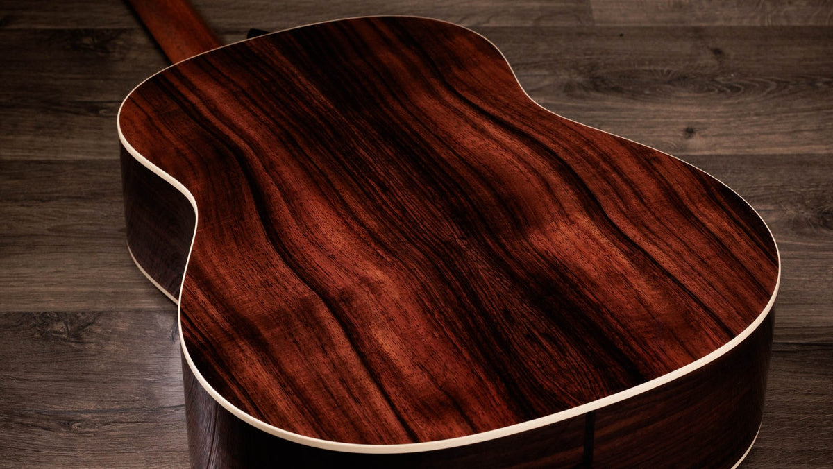 Đàn guitar acoustic điện Taylor Gold Label 717e mặt sunburst nâu vàng, pickguard kem – cận vân gỗ mặt lưng
