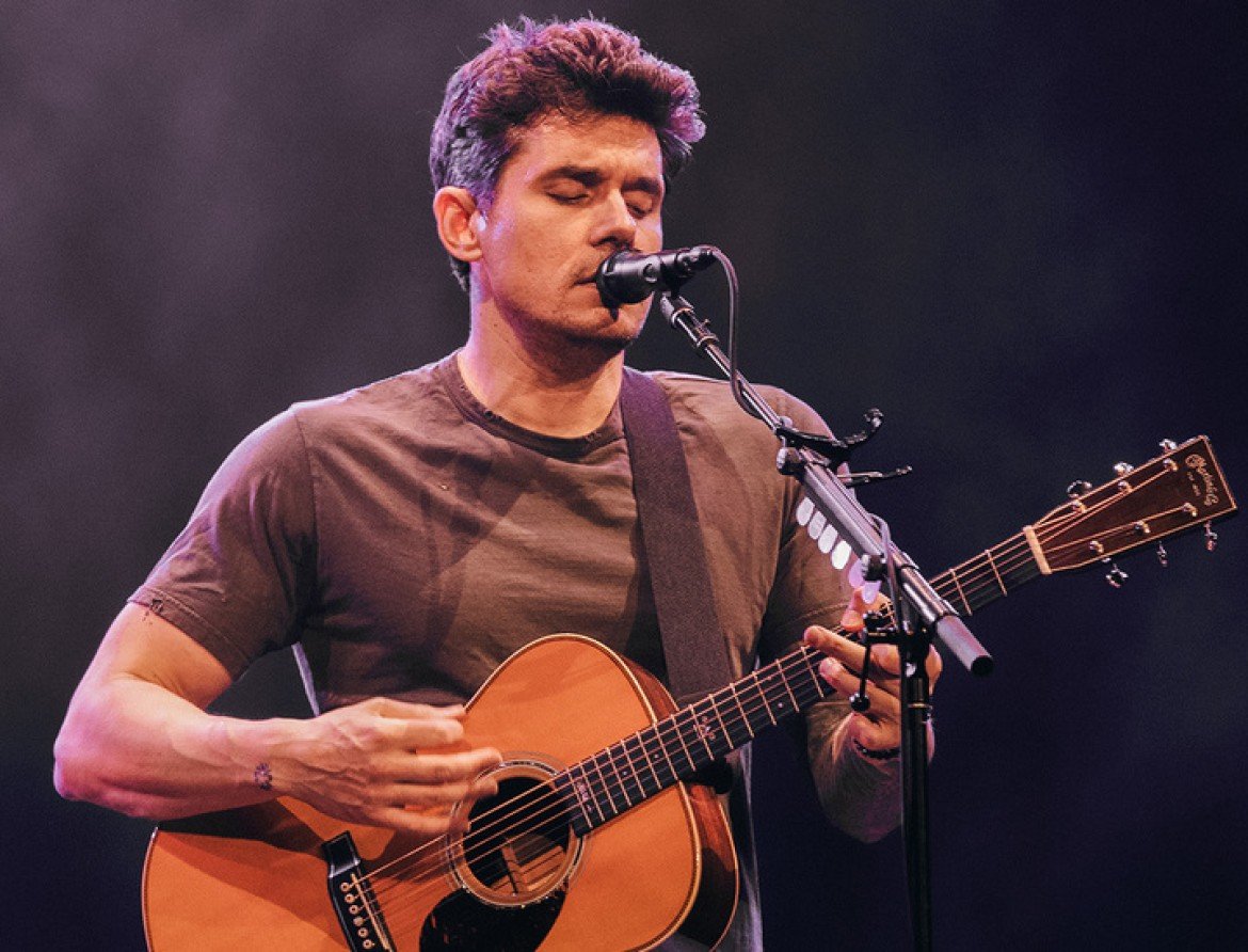 John Mayer biểu diễn với guitar acoustic – ảnh giới thiệu dòng Earthwood Bell Bronze của Ernie Ball