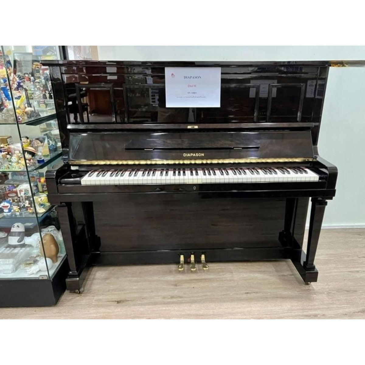 Đàn piano cơ upright TÂN NHẠC CỤ Diapason D66W màu đen bóng sang trọng, thiết kế cổ điển cao 131cm