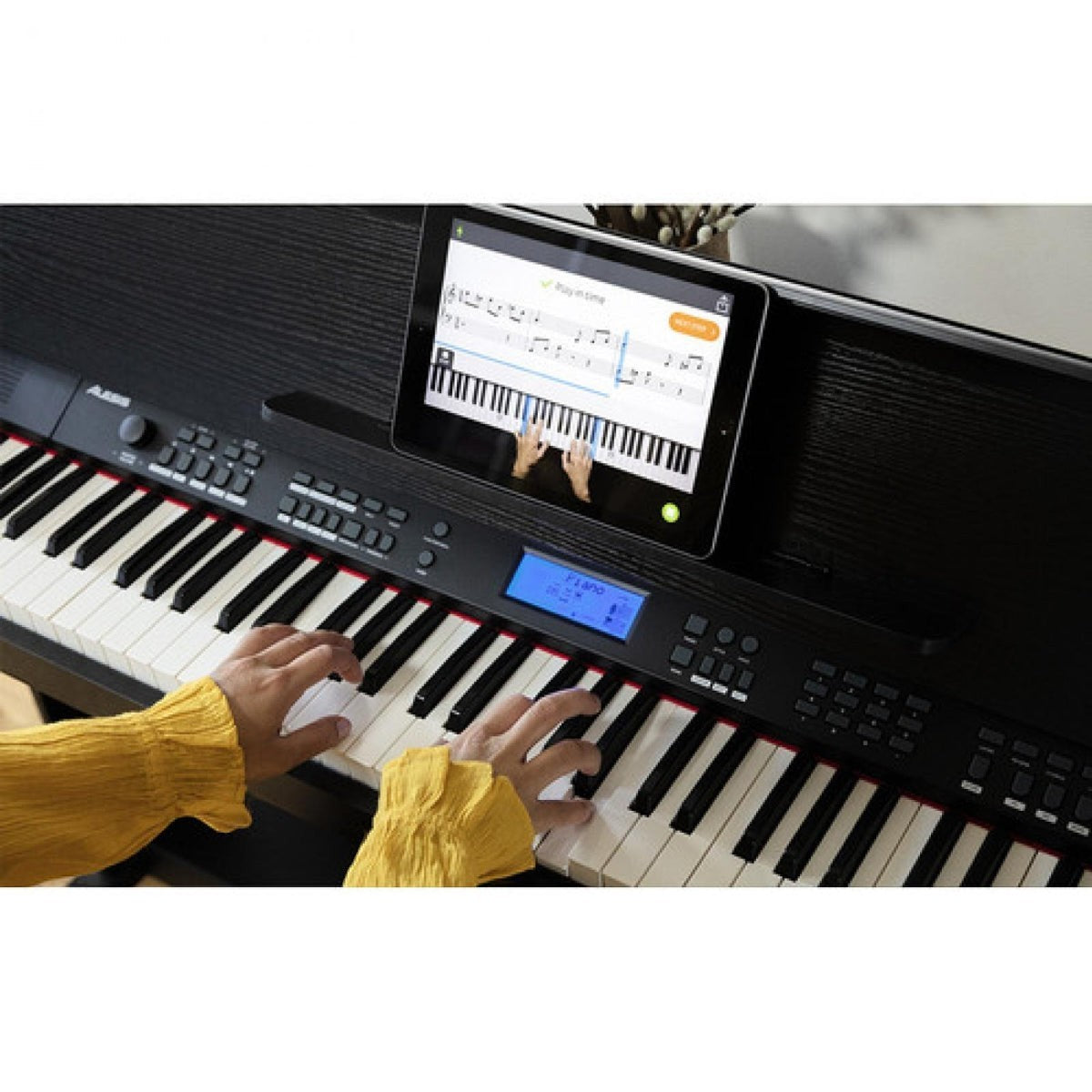 Đàn piano điện Alesis Virtue AHP-1 màu đen tại TÂN NHẠC CỤ với màn hình LCD và máy tính bảng hỗ trợ học tập