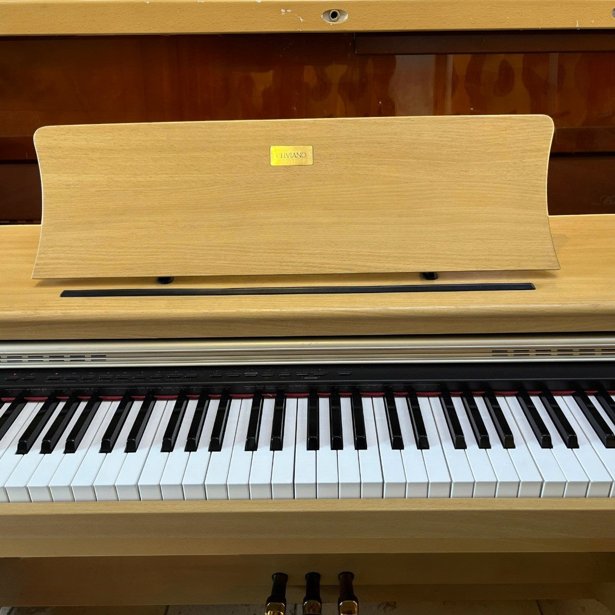 Đàn piano điện Casio AP-38 màu gỗ sáng với giá để nhạc tại Tân Nhạc Cụ