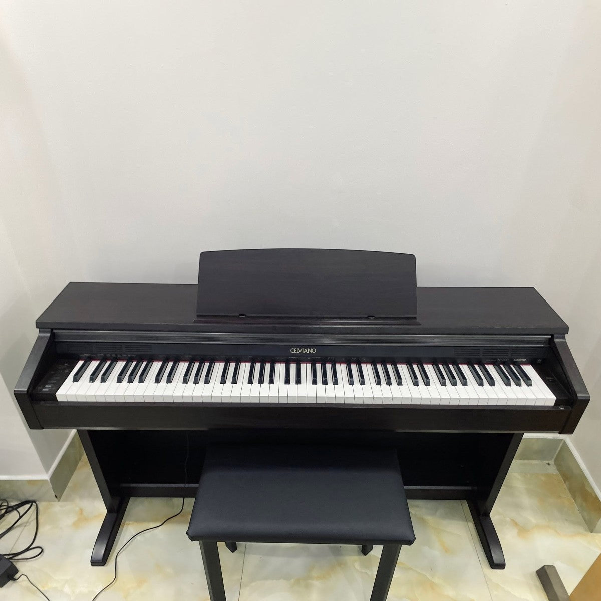 Đàn piano điện Casio AP200 màu đen dáng tủ Celviano với 88 phím búa tại TÂN NHẠC CỤ