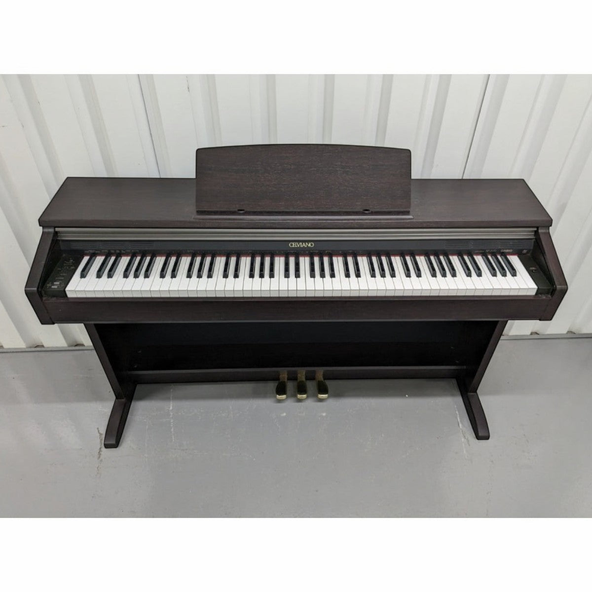 Đàn piano điện Casio AP200 dáng tủ màu nâu gỗ sang trọng tại TÂN NHẠC CỤ, thiết kế 88 phím búa chắc chắn