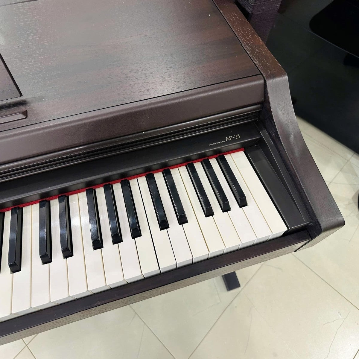 Đàn piano điện Casio AP21 màu nâu gỗ với bàn phím búa 88 phím tại TÂN NHẠC CỤ