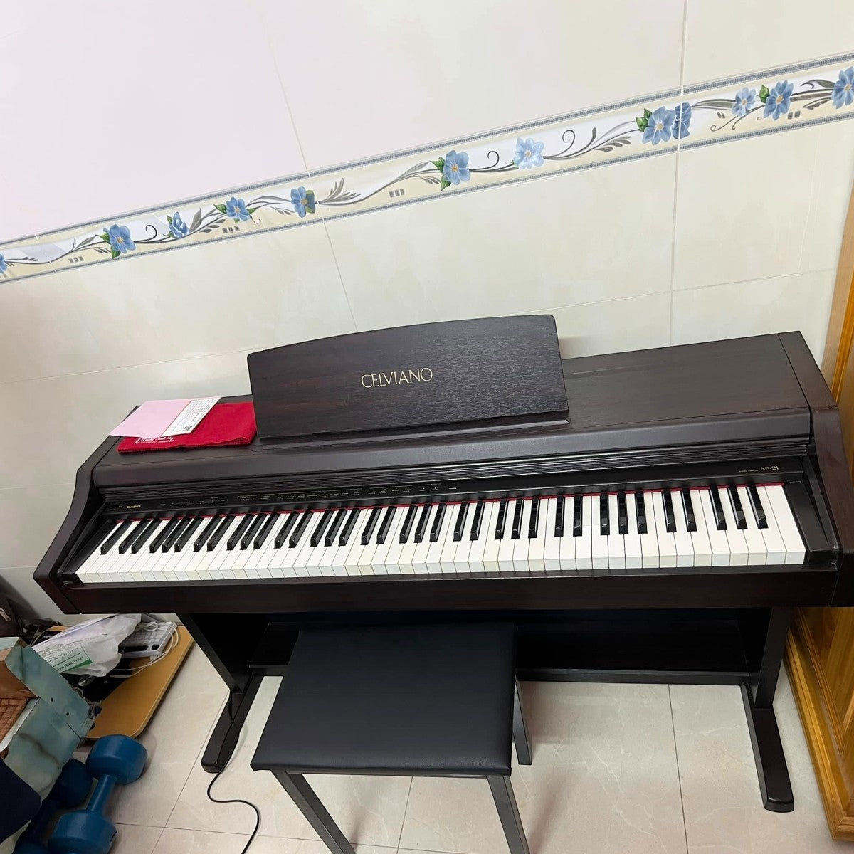 Đàn piano điện Casio AP21 dáng tủ màu nâu đen với bàn phím búa 88 phím tại Tân Nhạc Cụ