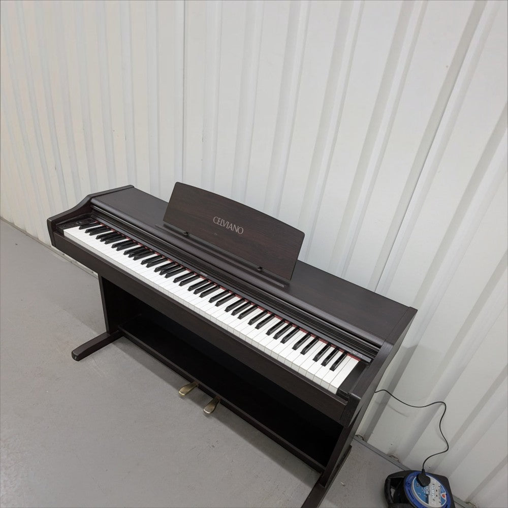 Đàn piano điện Casio AP25 Celviano màu nâu gỗ với thiết kế dáng tủ sang trọng tại TÂN NHẠC CỤ