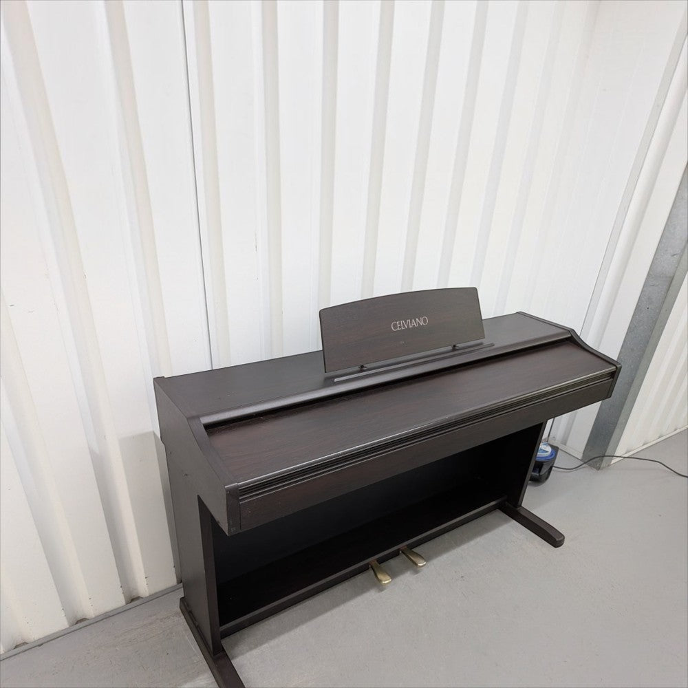 Đàn piano điện Casio AP25 Celviano màu nâu gỗ với thiết kế dáng tủ chắc chắn tại Tân Nhạc Cụ