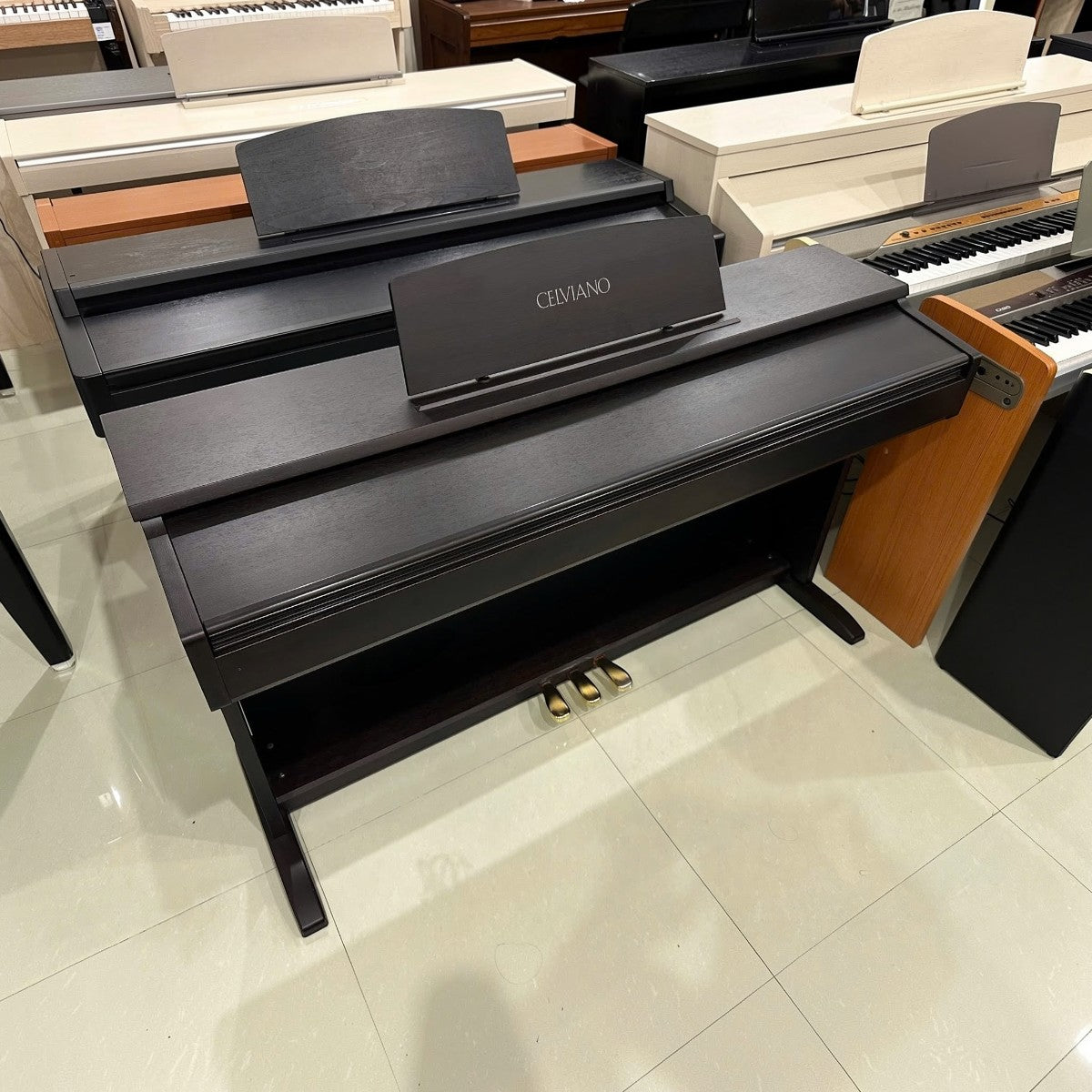 Đàn piano điện Casio AP26 màu đen dáng tủ Celviano với 88 phím búa tại showroom TÂN NHẠC CỤ
