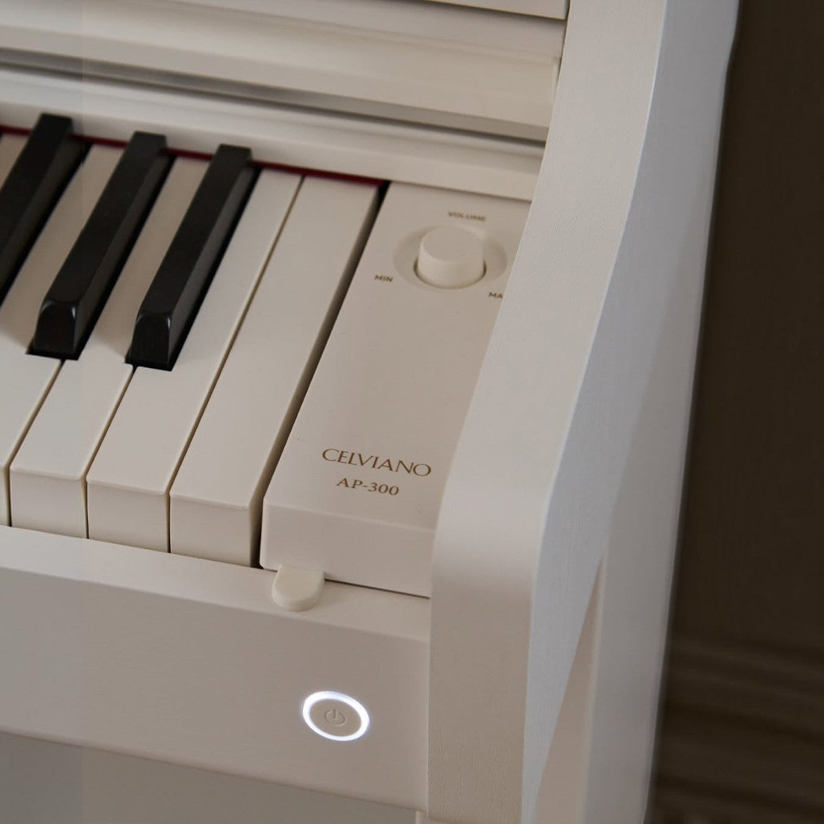 Đàn piano điện Casio AP-300 màu trắng tại TÂN NHẠC CỤ với thiết kế phím sang trọng và bảng điều khiển hiện đại