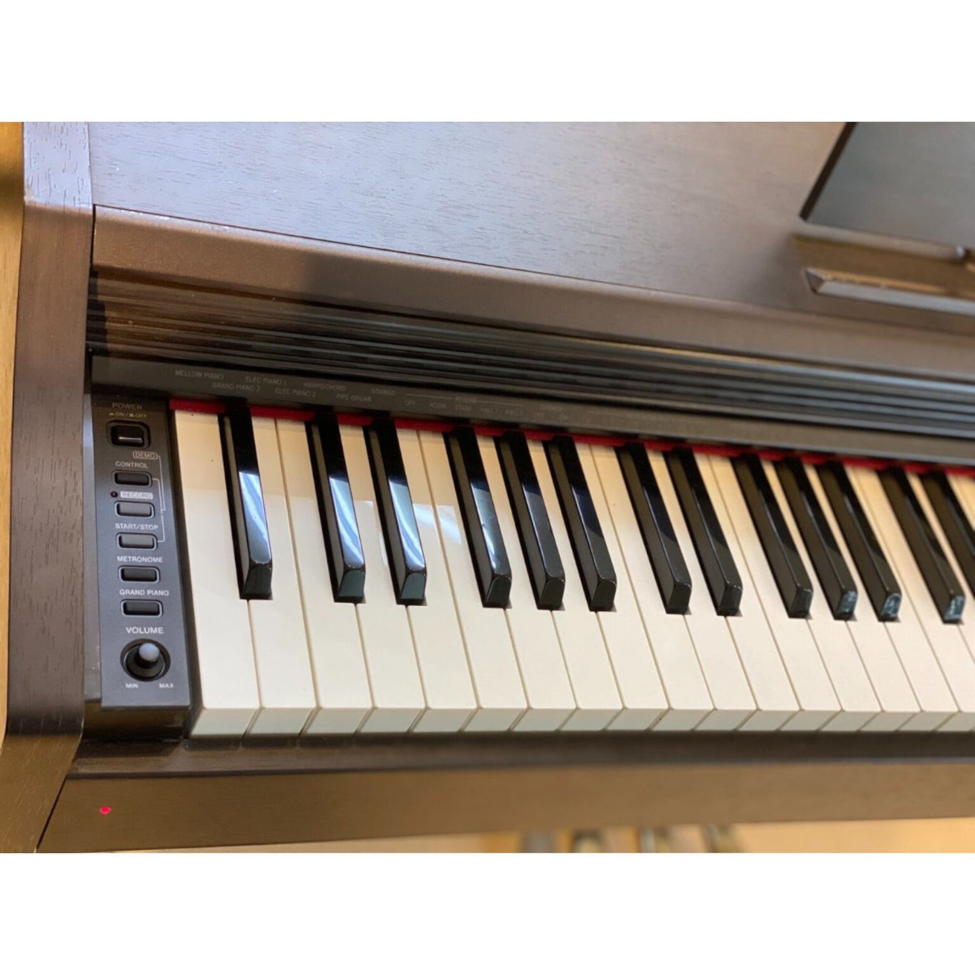 Bàn phím đàn piano điện Casio AP33 màu nâu gỗ với các nút điều khiển tại TÂN NHẠC CỤ
