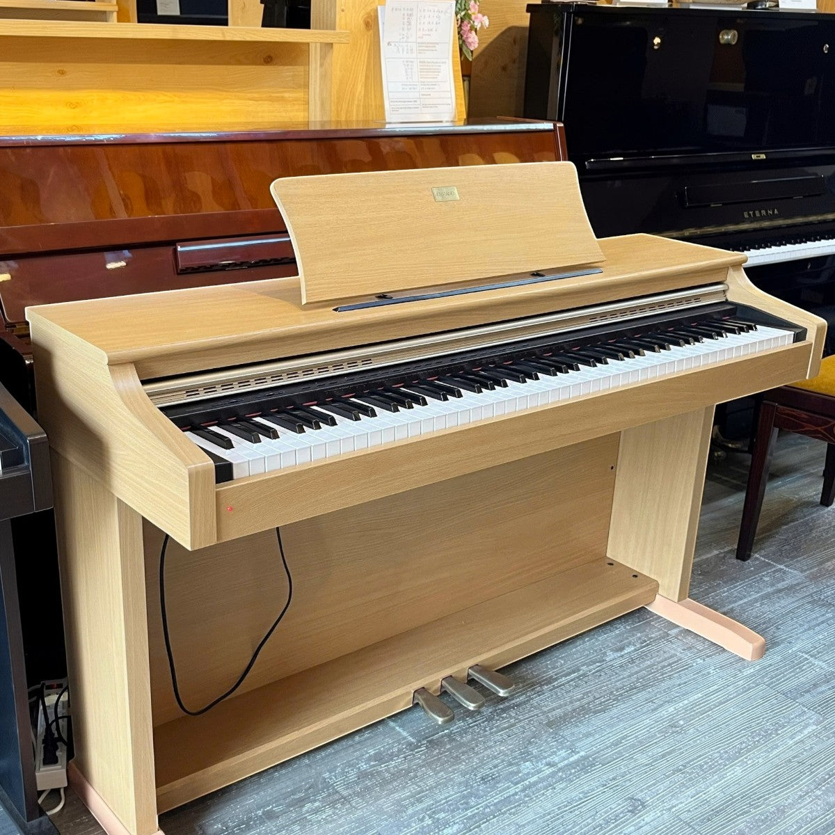 Đàn piano điện Casio AP-38 màu gỗ sáng tại Tân Nhạc Cụ, thiết kế tủ console cổ điển với 88 phím búa