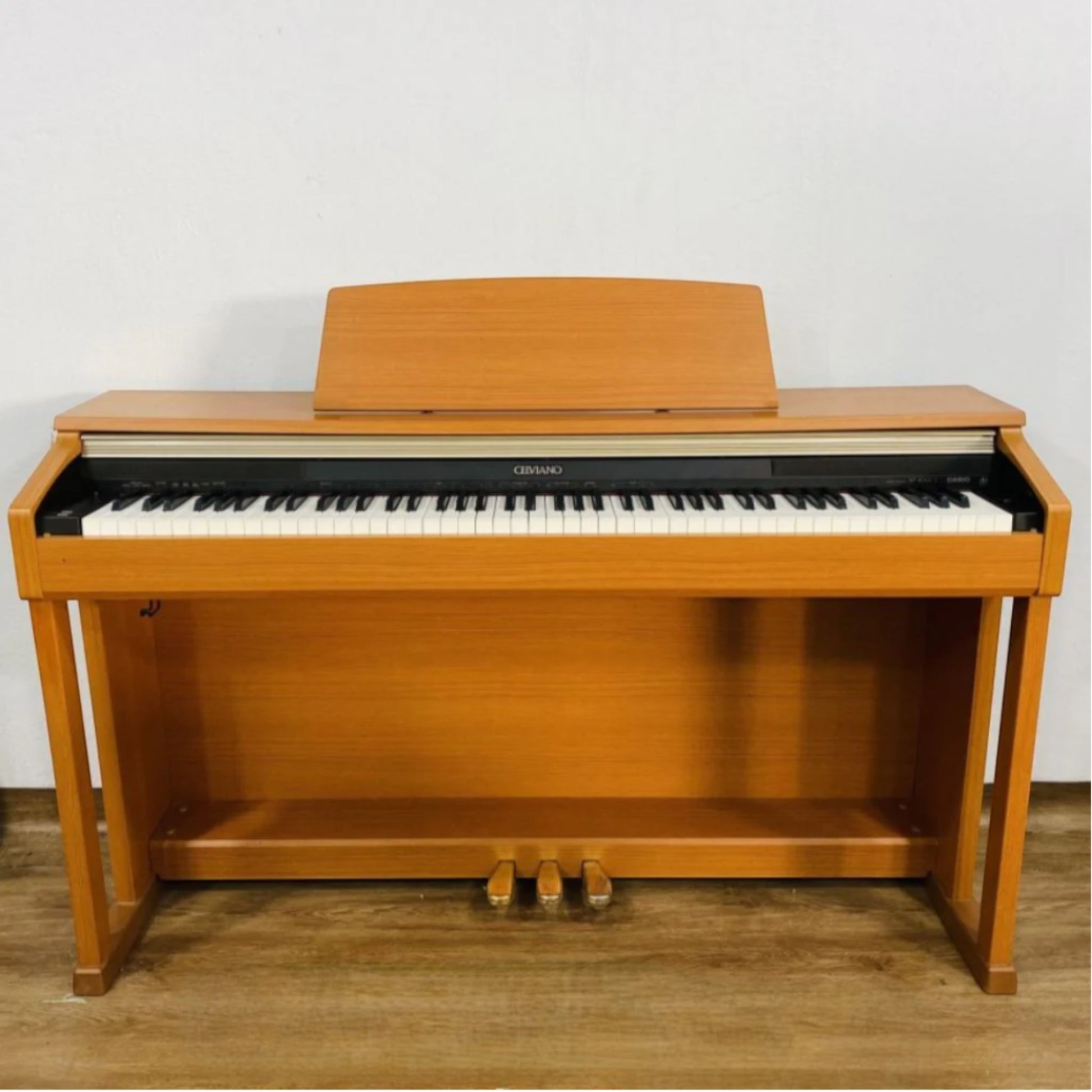 Đàn piano điện TÂN NHẠC CỤ Casio AP400CY màu vàng gỗ sang trọng với thiết kế nhỏ gọn và bàn phím 88 phím chuẩn