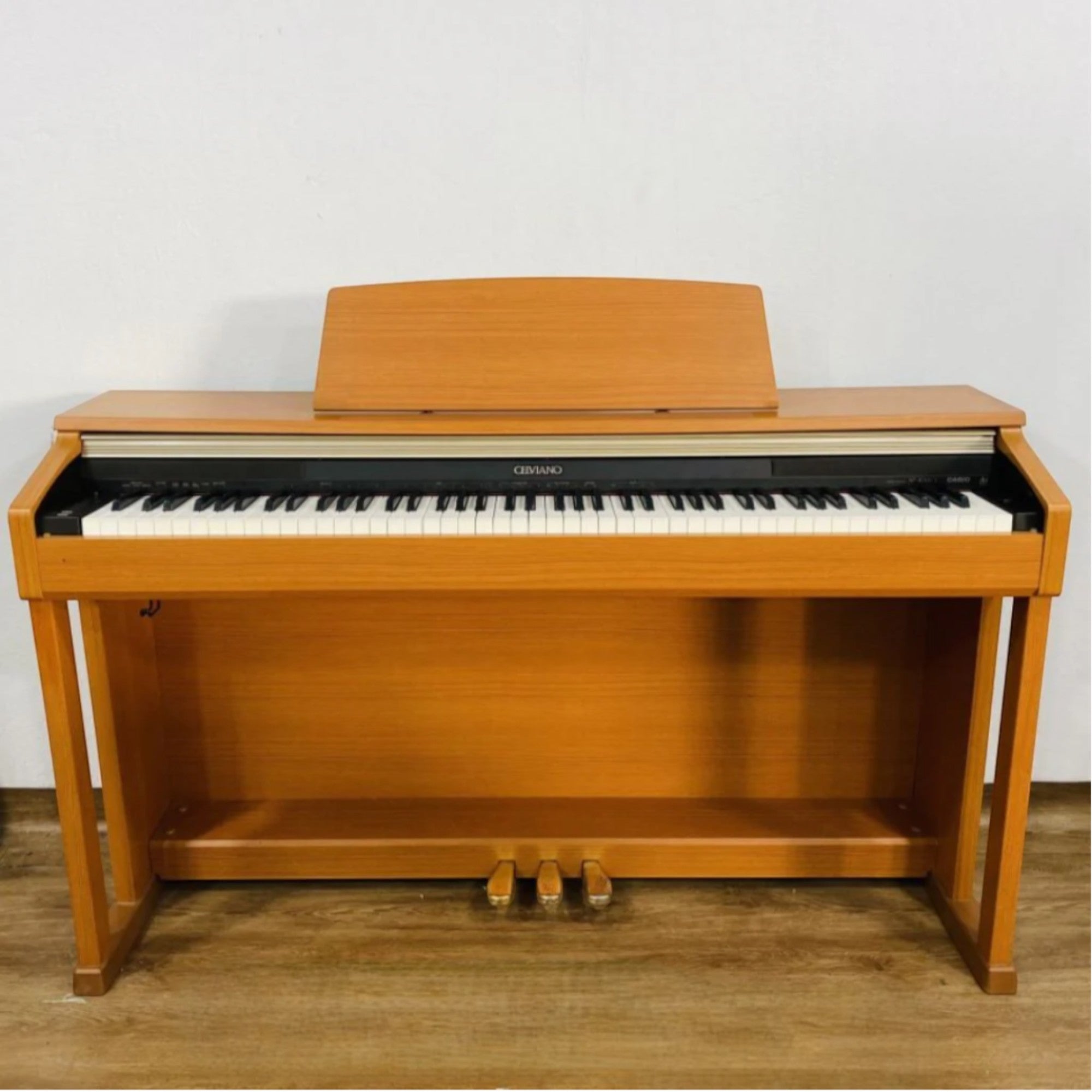 Đàn piano điện TÂN NHẠC CỤ Casio AP400CY màu vàng gỗ sang trọng với thiết kế nhỏ gọn và bàn phím 88 phím chuẩn