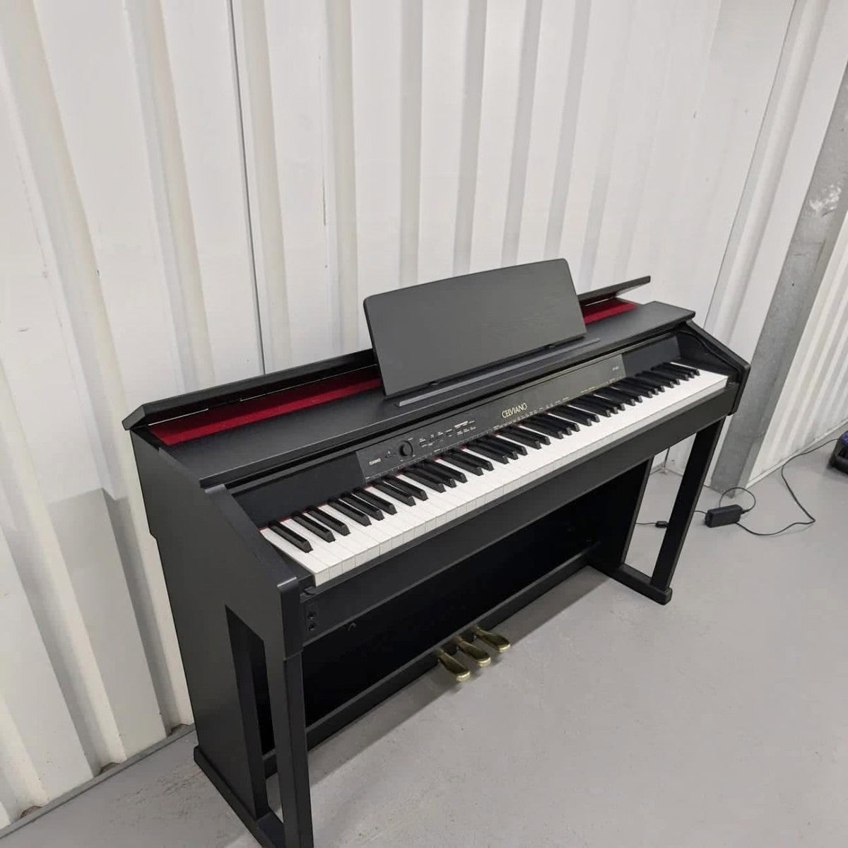 Đàn piano điện Casio AP450 màu đen dáng tủ Celviano với bàn phím búa Tri-sensor tại Tân Nhạc Cụ