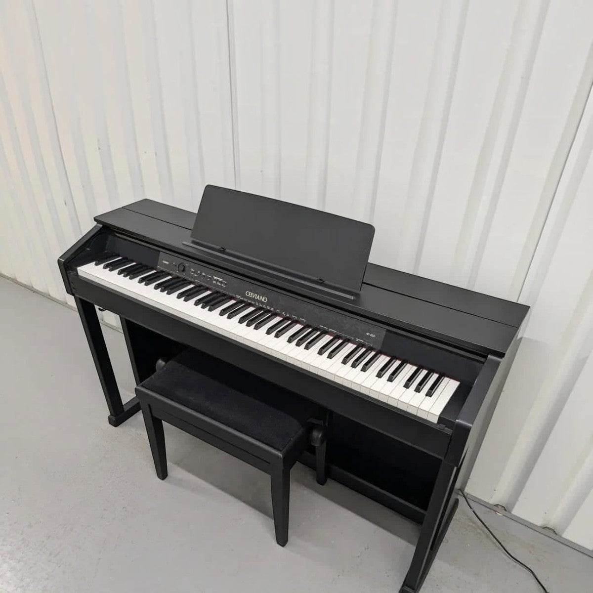 Đàn piano điện Casio AP450 màu đen sang trọng với thiết kế dáng tủ Celviano tại cửa hàng TÂN NHẠC CỤ