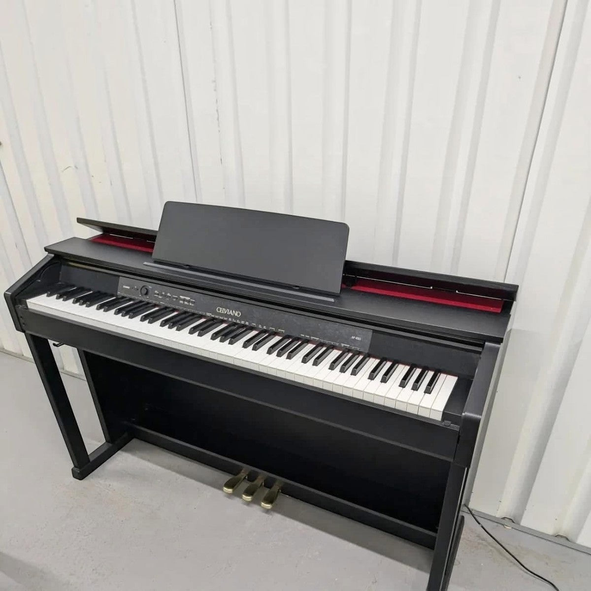 Đàn piano điện Casio AP450 màu đen dáng tủ Celviano với bàn phím búa Tri-sensor tại Tân Nhạc Cụ