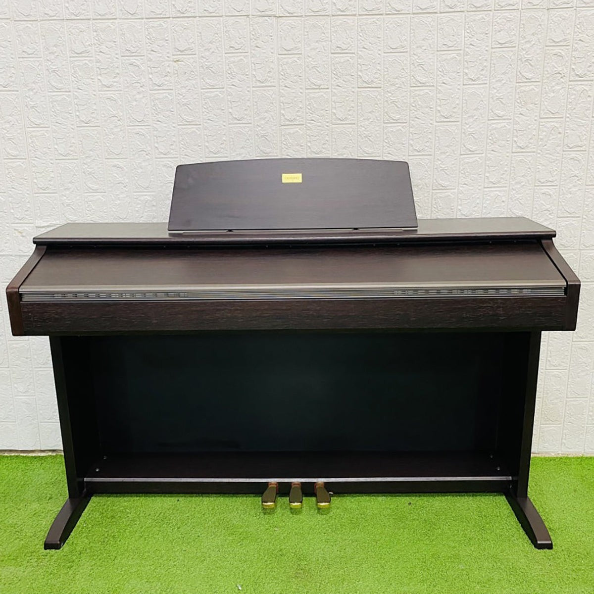 Đàn piano điện Casio AP45 dáng tủ màu nâu gỗ sang trọng tại Tân Nhạc Cụ với 88 phím búa chuẩn