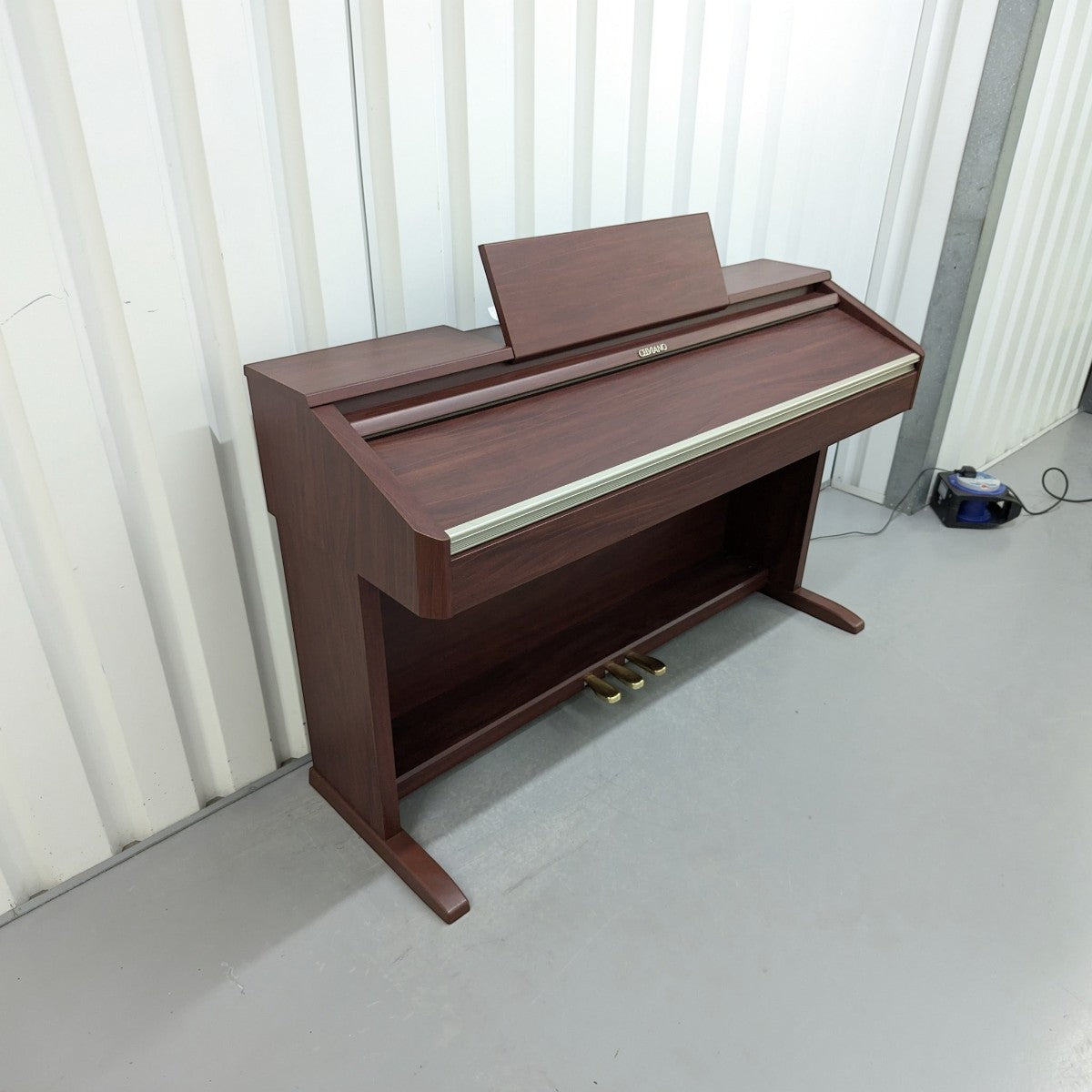 Đàn piano điện Casio AP-500 dáng tủ màu gỗ sang trọng tại Tân Nhạc Cụ
