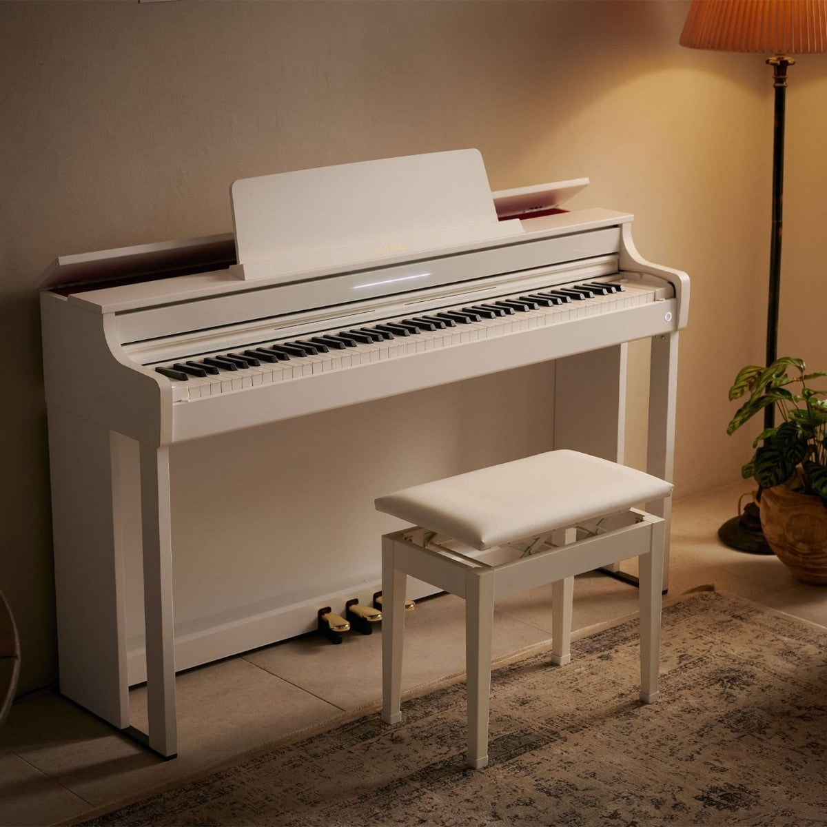 Đàn piano điện Casio AP-550 màu trắng sang trọng tại Tân Nhạc Cụ, kèm ghế và nắp đàn mở được.