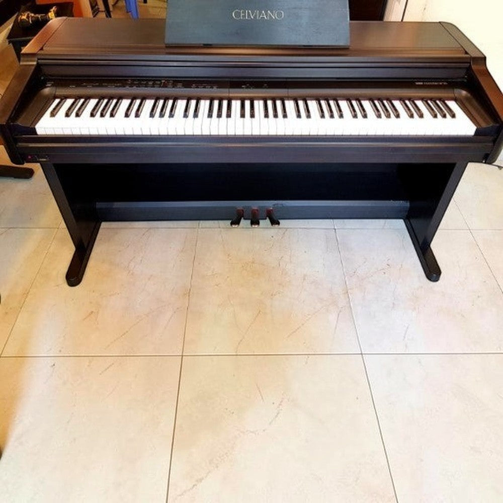 Đàn piano điện Casio AP-55 dáng tủ màu nâu gỗ sang trọng tại TÂN NHẠC CỤ, thiết kế 88 phím nặng chuẩn Celviano