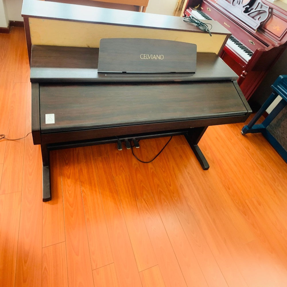 Đàn piano điện Casio Celviano AP-60 dáng tủ màu nâu gỗ sang trọng tại cửa hàng TÂN NHẠC CỤ