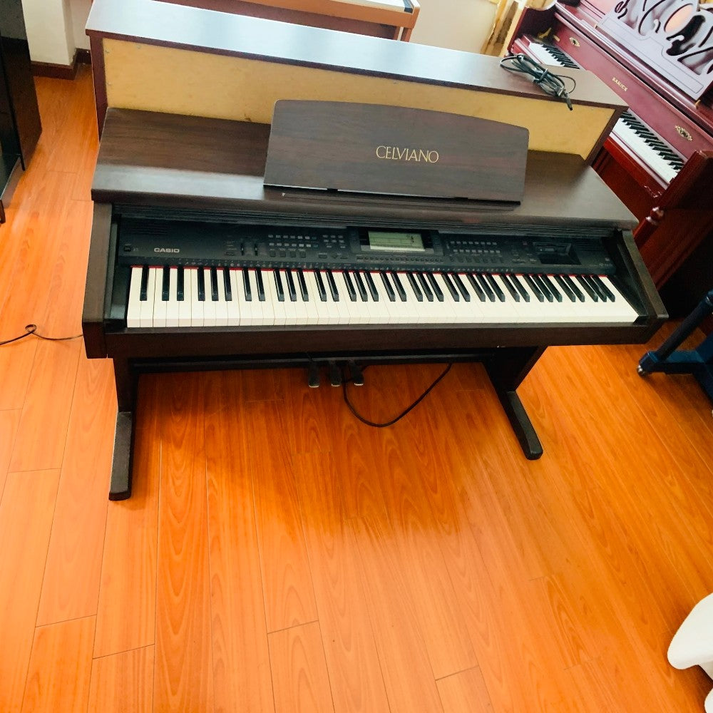 Đàn piano điện Casio Celviano AP-60 dáng tủ màu nâu gỗ với 88 phím búa tại cửa hàng Tân Nhạc Cụ
