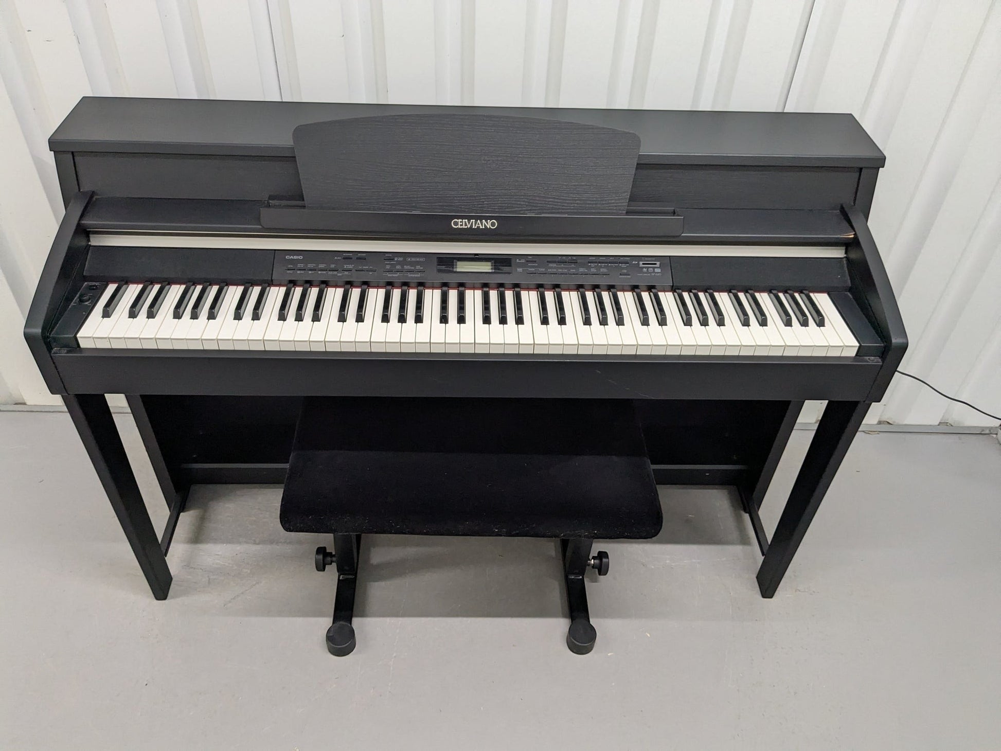 Đàn piano điện Casio AP620 màu đen sang trọng với bàn phím búa giả gỗ mun và ngà voi tại TÂN NHẠC CỤ