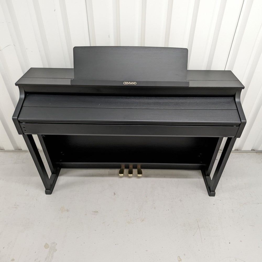 Đàn piano điện TÂN NHẠC CỤ Casio AP650 màu đen dáng tủ sang trọng với thiết kế Celviano cao cấp