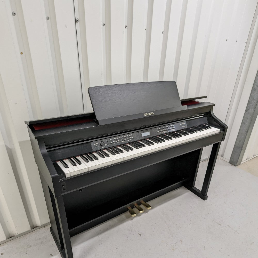 Đàn piano điện TÂN NHẠC CỤ Casio AP650 màu đen dáng tủ sang trọng với bàn phím 88 phím và màn hình LCD