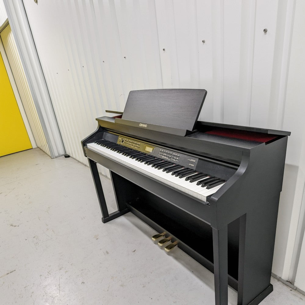 Đàn piano điện Casio AP650 màu đen dáng tủ cao cấp tại TÂN NHẠC CỤ với bàn phím búa 3 cảm biến và hệ loa mạnh mẽ
