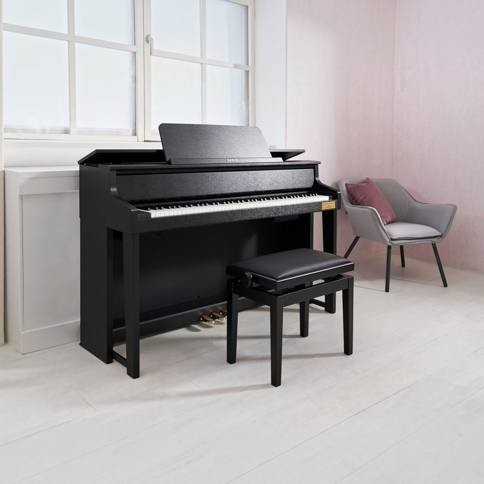 Đàn piano điện Casio GP-310 màu đen tại showroom TÂN NHẠC CỤ, thiết kế dáng grand hybrid với bộ máy phím gỗ sang trọng.