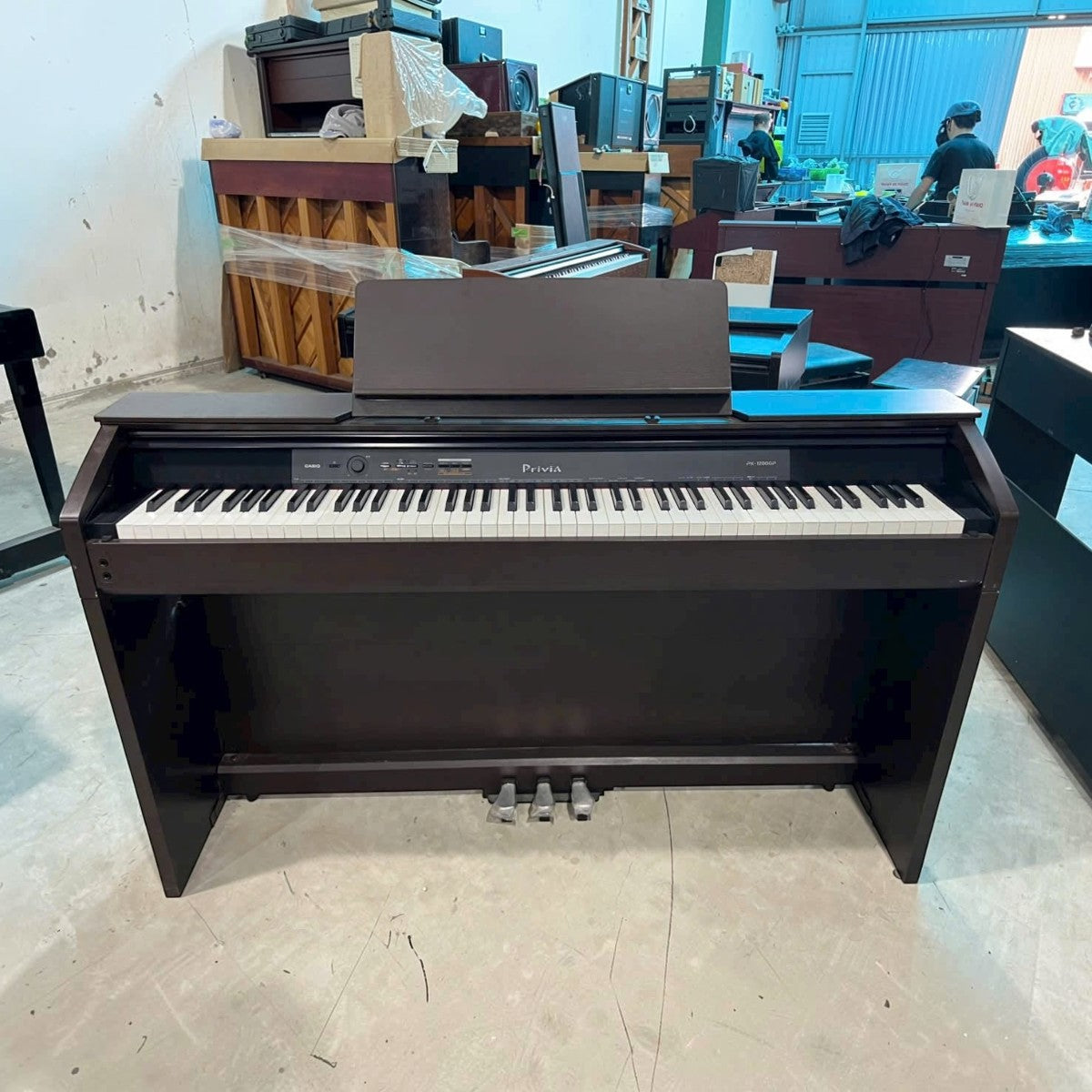 Đàn piano điện Casio PX-1200GP dáng console màu nâu tại Tân Nhạc Cụ với bàn phím búa 88 phím
