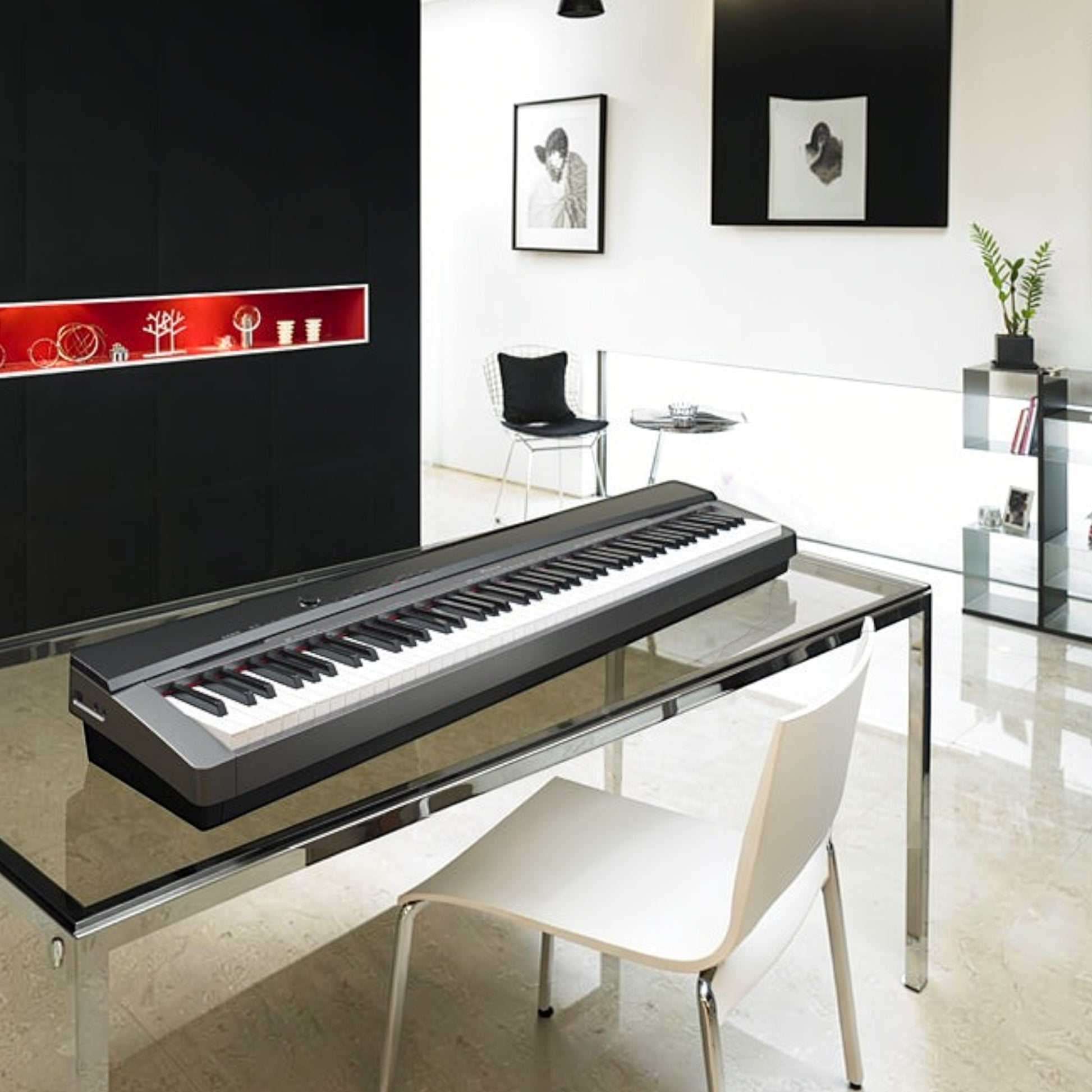 Đàn piano điện Casio PX130 màu đen thiết kế gọn nhẹ đặt trên bàn kính tại showroom TÂN NHẠC CỤ