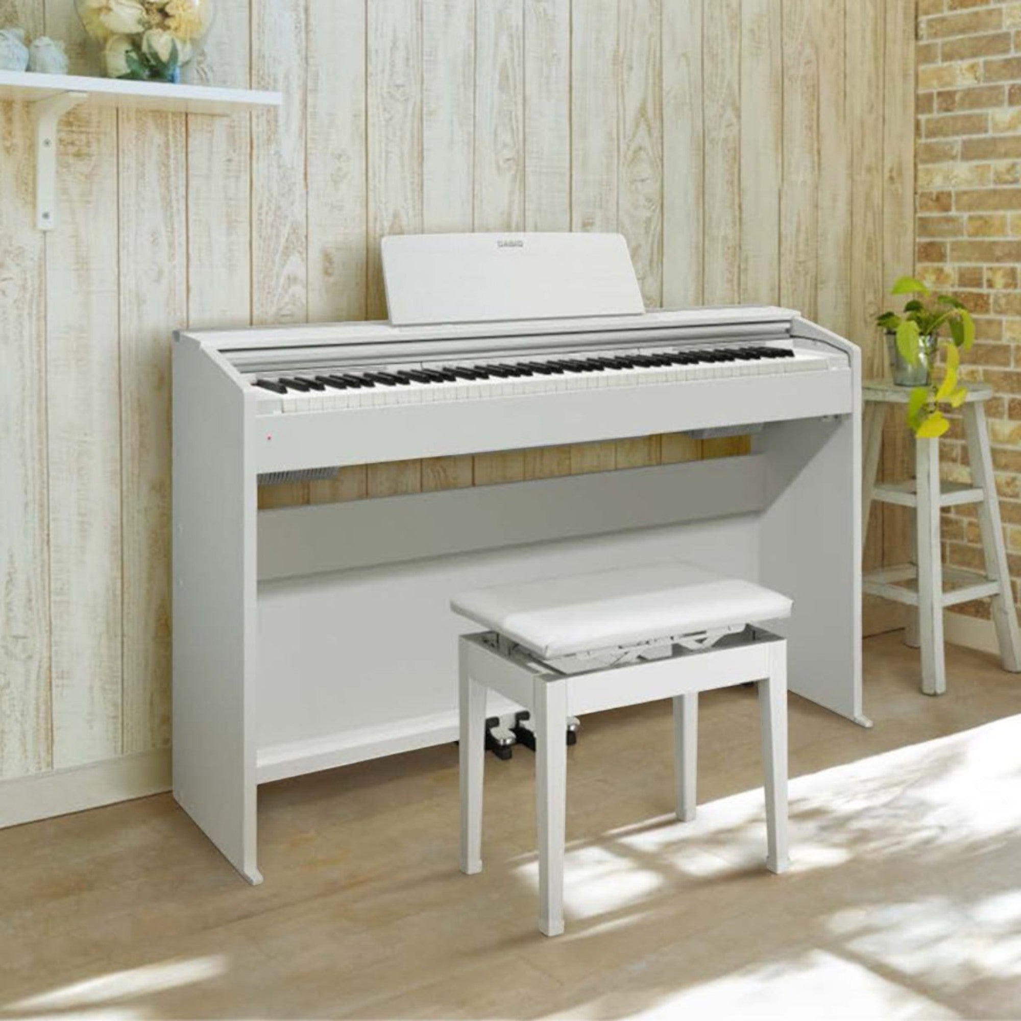 Đàn piano điện Casio PX2000GP màu trắng sang trọng tại TÂN NHẠC CỤ với thiết kế hiện đại và ghế ngồi đi kèm.