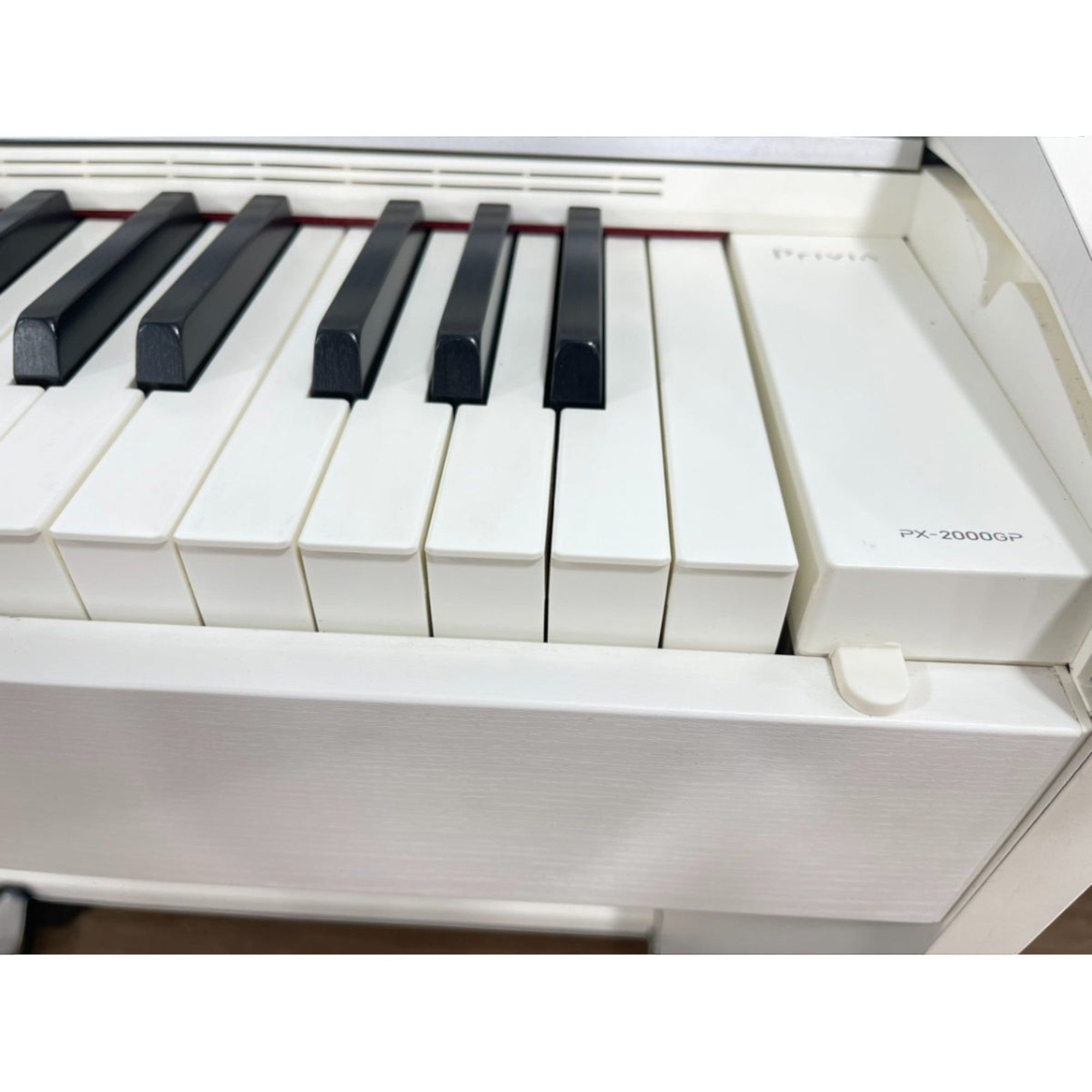 Bàn phím đàn piano điện TÂN NHẠC CỤ Casio PX-2000GP màu trắng với thiết kế 88 phím cảm ứng chân thực