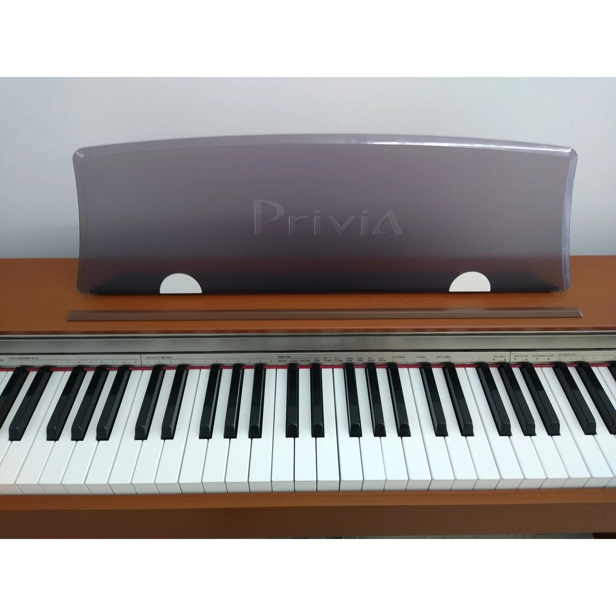 Bàn phím đàn piano điện Casio PX-730 Privia màu gỗ với giá để nhạc trong suốt tại Tân Nhạc Cụ